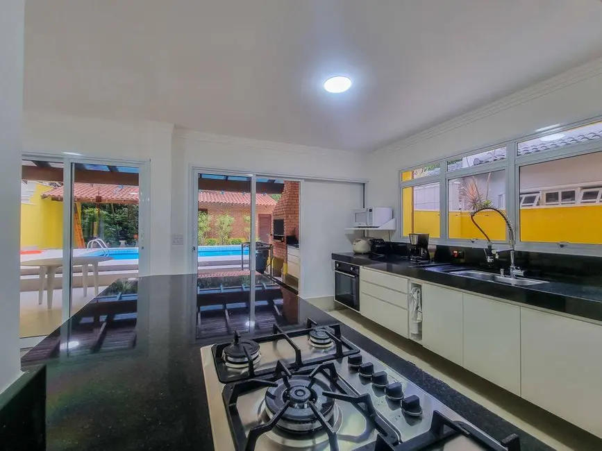 Foto 8 de Casa com 6 quartos à venda, 209m2 em Riviera de São Lourenço, Bertioga - SP