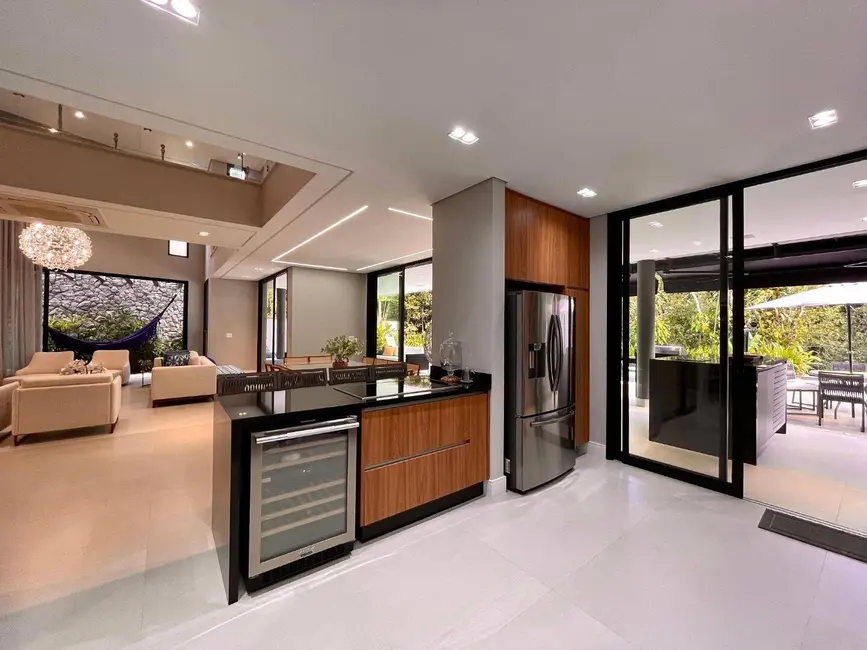 Foto 9 de Casa com 5 quartos à venda, 450m2 em Riviera de São Lourenço, Bertioga - SP