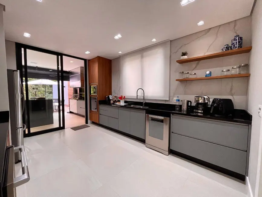 Foto 8 de Casa com 5 quartos à venda, 450m2 em Riviera de São Lourenço, Bertioga - SP