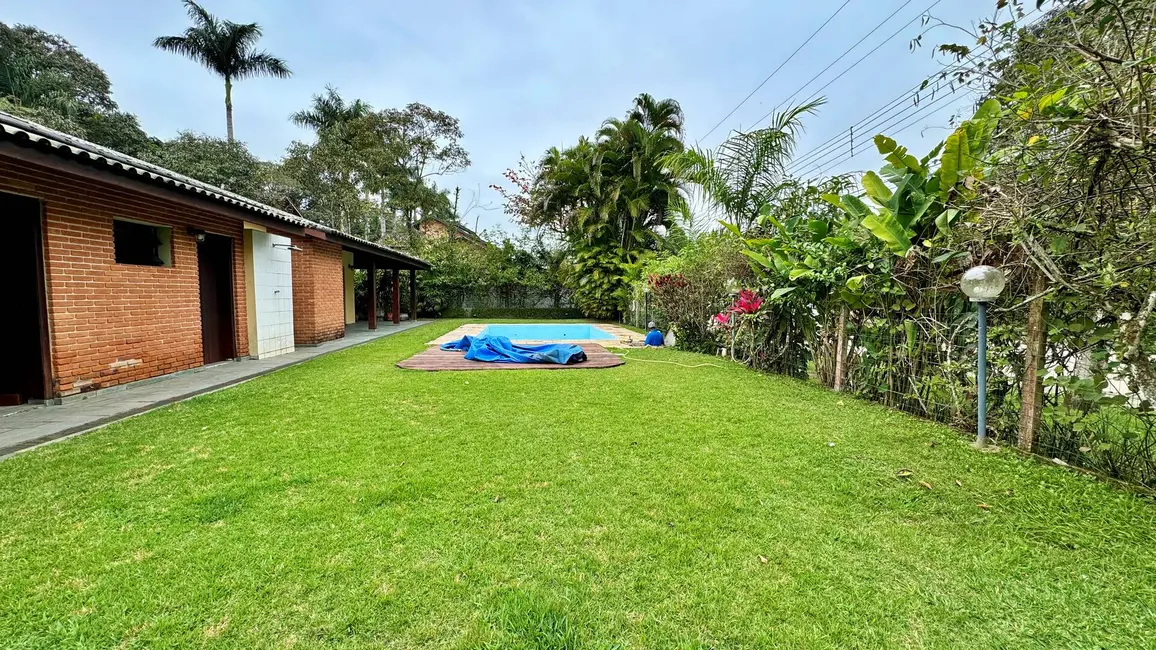 Foto 2 de Casa com 5 quartos à venda, 489m2 em Riviera de São Lourenço, Bertioga - SP