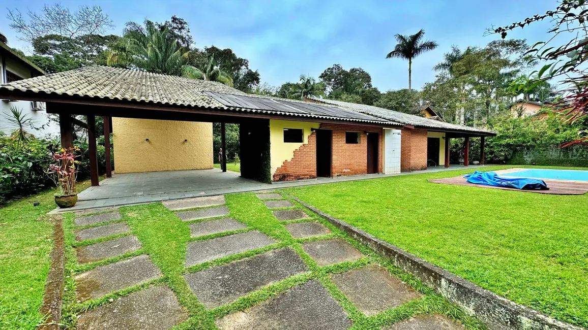 Foto 1 de Casa com 5 quartos à venda, 489m2 em Riviera de São Lourenço, Bertioga - SP
