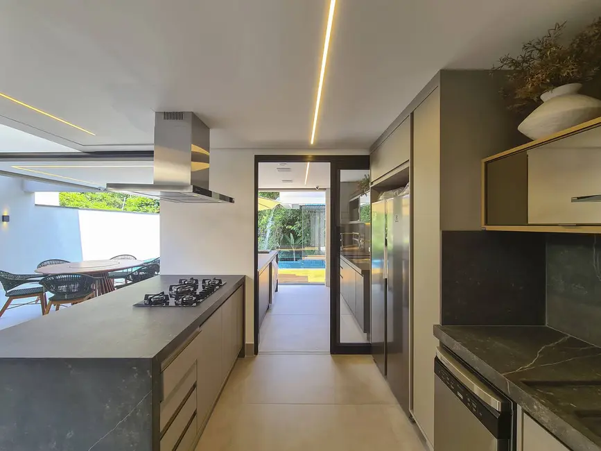 Foto 4 de Casa com 5 quartos à venda, 409m2 em Riviera de São Lourenço, Bertioga - SP