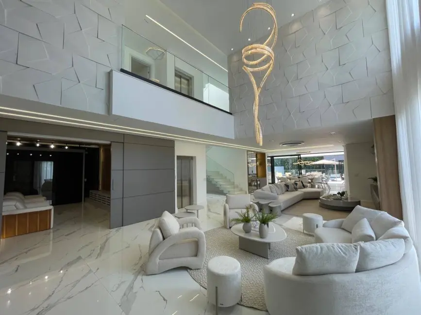 Casa com 7 quartos à venda, 1000m2 em Riviera de São Lourenço, Bertioga - SP - imagem 1 Foto 1 de Casa com 7 quartos à venda, 1000m2 em Riviera de São Lourenço, Bertioga - SP