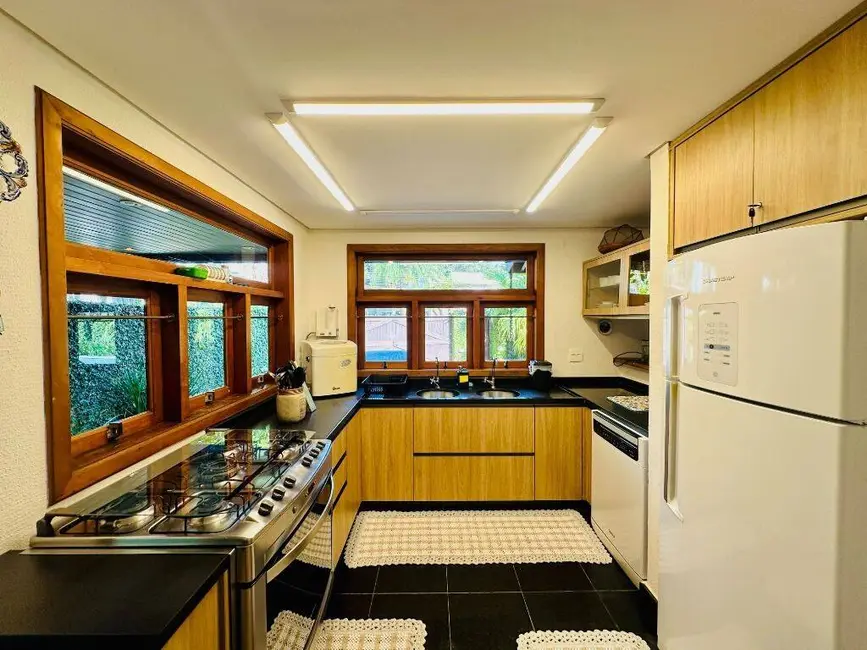Foto 9 de Casa com 5 quartos à venda, 328m2 em Riviera de São Lourenço, Bertioga - SP