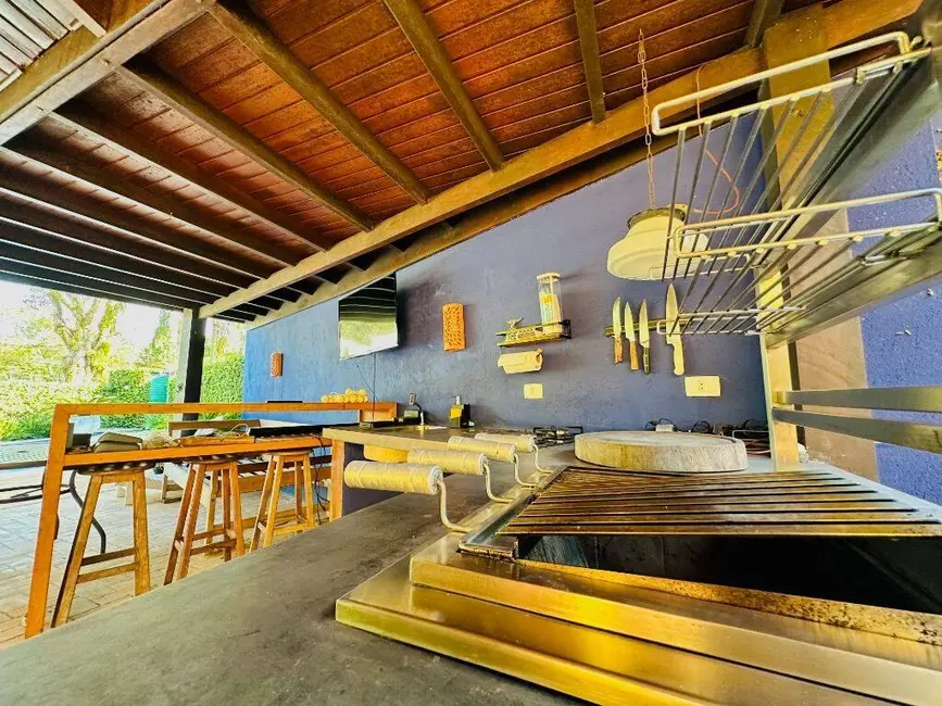 Foto 4 de Casa com 5 quartos à venda, 328m2 em Riviera de São Lourenço, Bertioga - SP