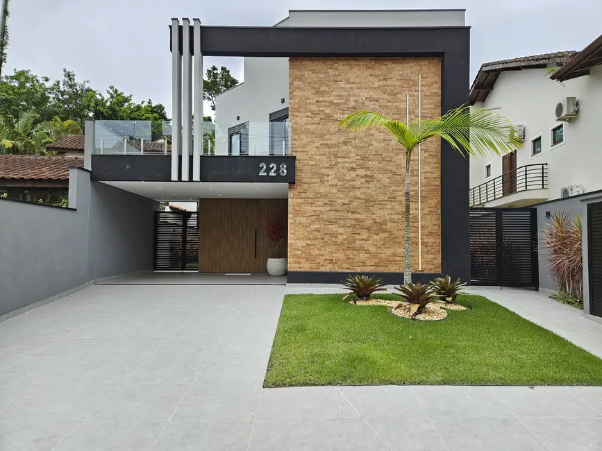 Foto 1 de Casa com 5 quartos à venda, 309m2 em Riviera de São Lourenço, Bertioga - SP