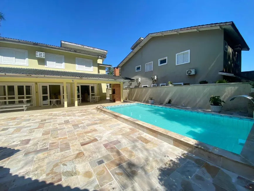 Foto 1 de Casa com 3 quartos à venda, 200m2 em Riviera de São Lourenço, Bertioga - SP