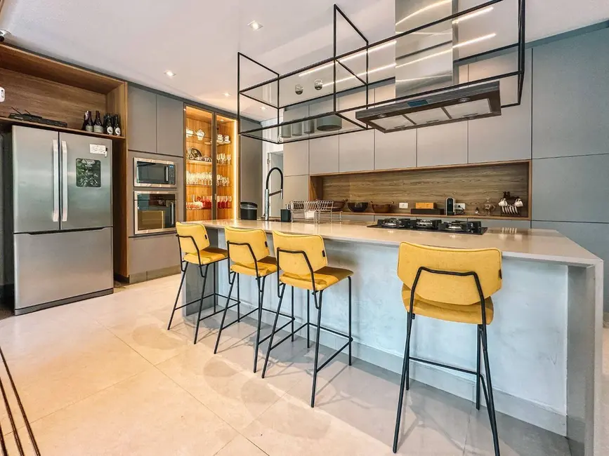 Foto 9 de Casa com 7 quartos à venda, 482m2 em Riviera de São Lourenço, Bertioga - SP