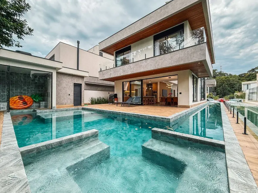 Foto 1 de Casa com 4 quartos à venda, 316m2 em Riviera de São Lourenço, Bertioga - SP