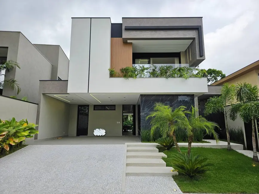 Foto 1 de Casa com 5 quartos à venda, 331m2 em Riviera de São Lourenço, Bertioga - SP