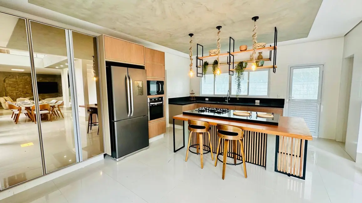 Foto 9 de Casa com 4 quartos à venda, 350m2 em Riviera de São Lourenço, Bertioga - SP