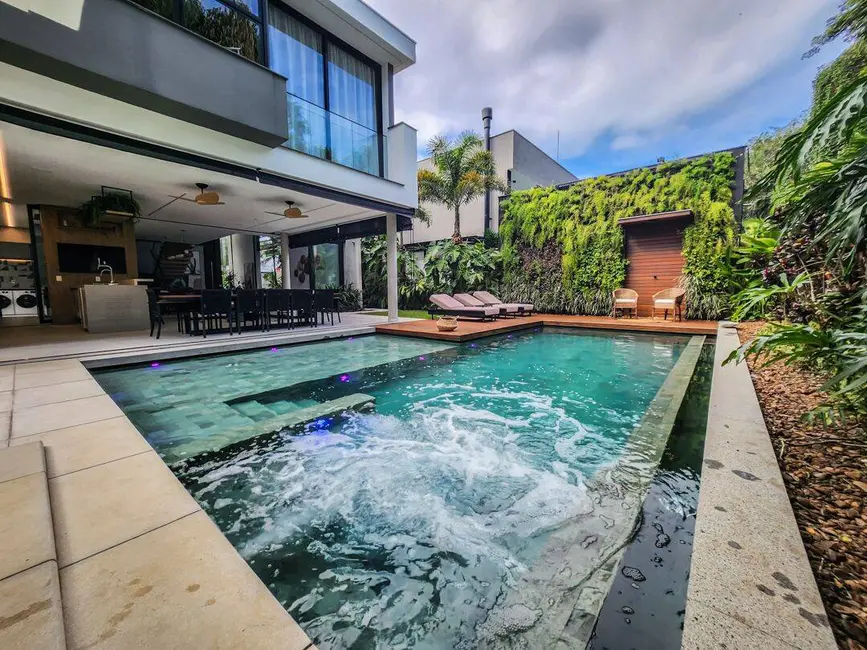 Foto 1 de Casa com 7 quartos à venda, 479m2 em Riviera de São Lourenço, Bertioga - SP