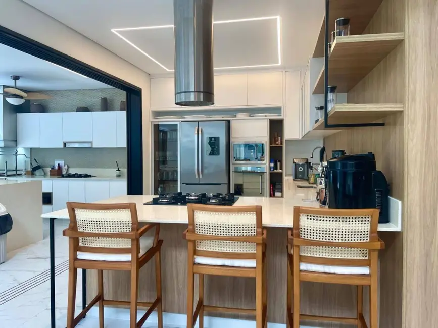 Foto 9 de Casa com 5 quartos à venda, 396m2 em Riviera de São Lourenço, Bertioga - SP