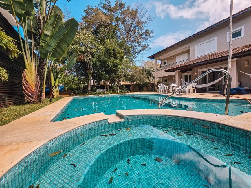 Casa com 4 quartos à venda, 504m2 em Riviera de São Lourenço, Bertioga - SP - imagem 1 Foto 1 de Casa com 4 quartos à venda, 504m2 em Riviera de São Lourenço, Bertioga - SP