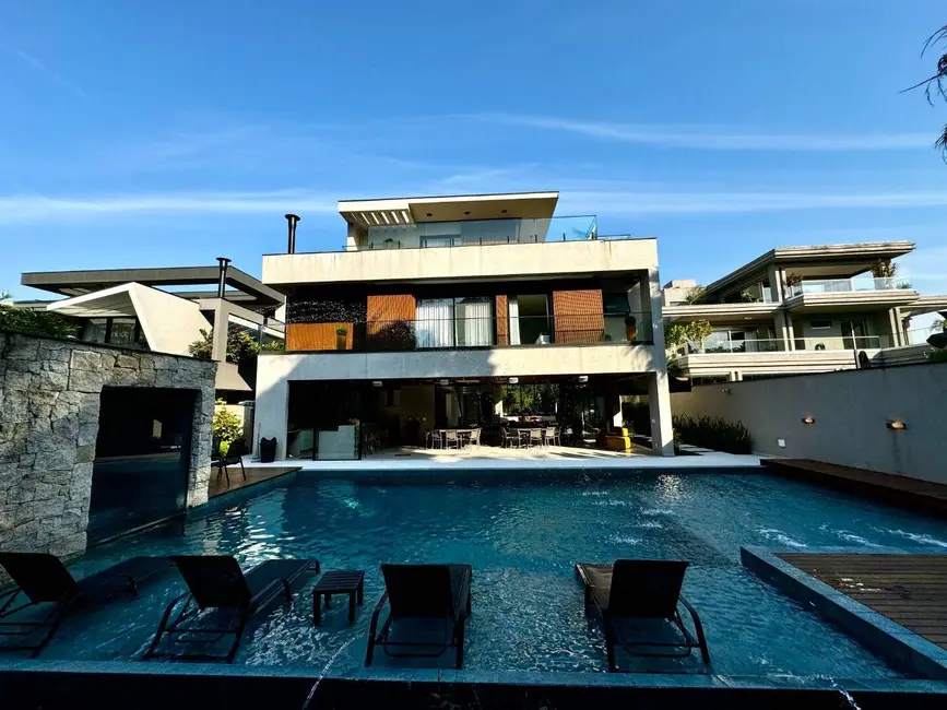 Foto 1 de Casa com 9 quartos à venda, 976m2 em Riviera de São Lourenço, Bertioga - SP