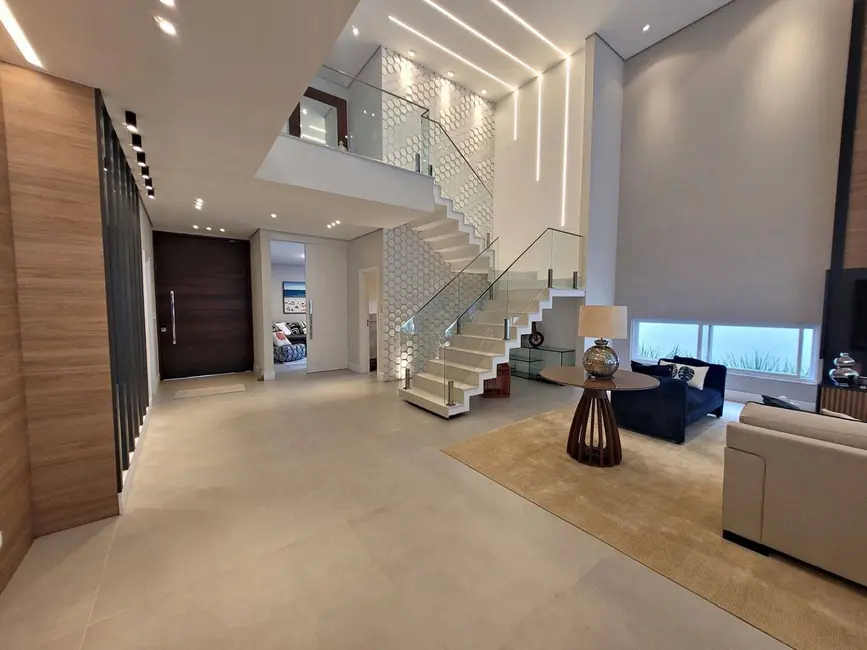 Foto 4 de Casa com 7 quartos à venda, 507m2 em Riviera de São Lourenço, Bertioga - SP