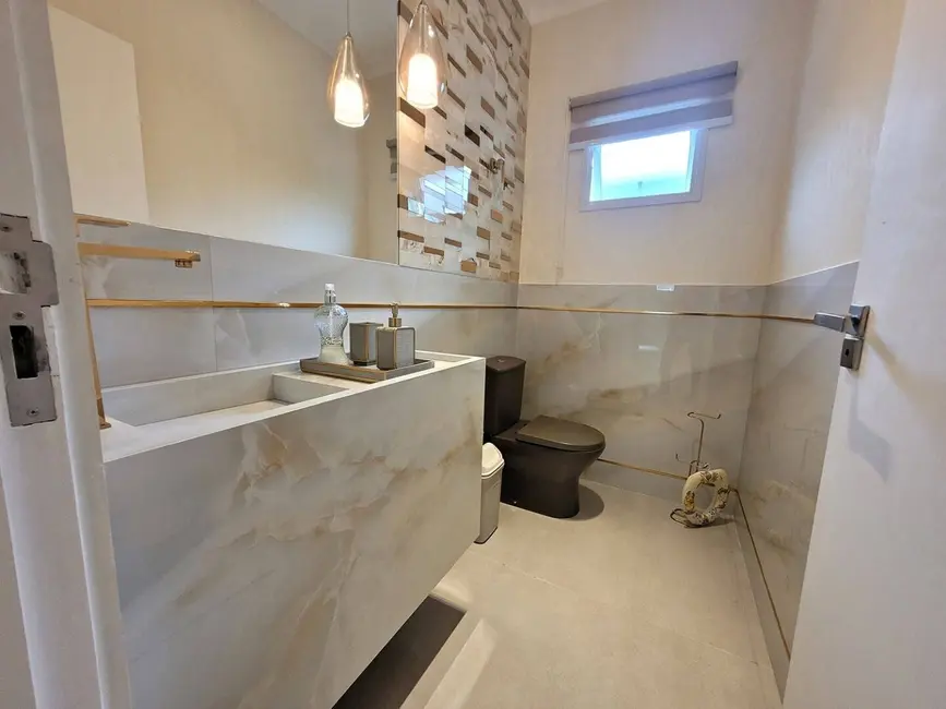 Foto 5 de Casa com 7 quartos à venda, 507m2 em Riviera de São Lourenço, Bertioga - SP