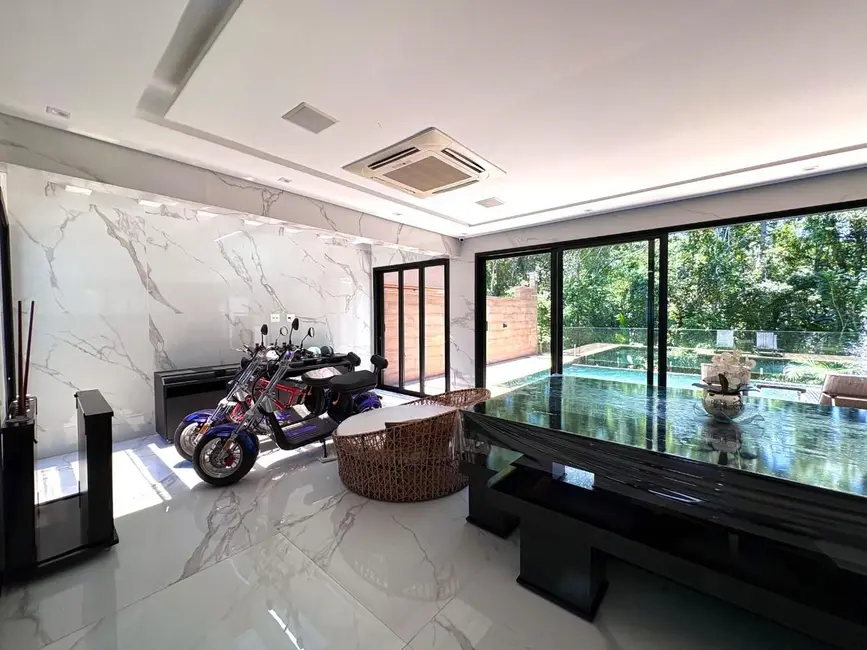 Foto 7 de Casa com 5 quartos à venda, 360m2 em Riviera de São Lourenço, Bertioga - SP
