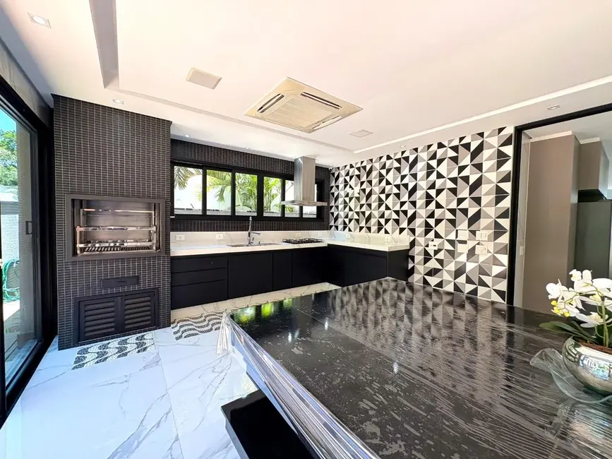 Foto 5 de Casa com 5 quartos à venda, 360m2 em Riviera de São Lourenço, Bertioga - SP