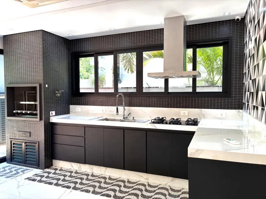 Foto 6 de Casa com 5 quartos à venda, 360m2 em Riviera de São Lourenço, Bertioga - SP