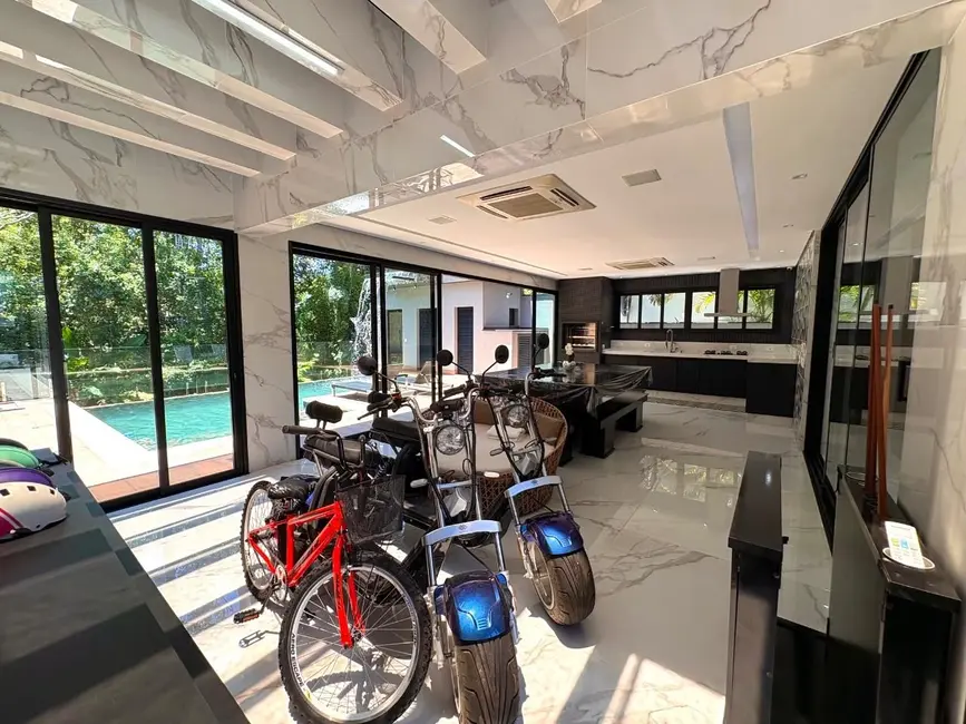 Foto 8 de Casa com 5 quartos à venda, 360m2 em Riviera de São Lourenço, Bertioga - SP