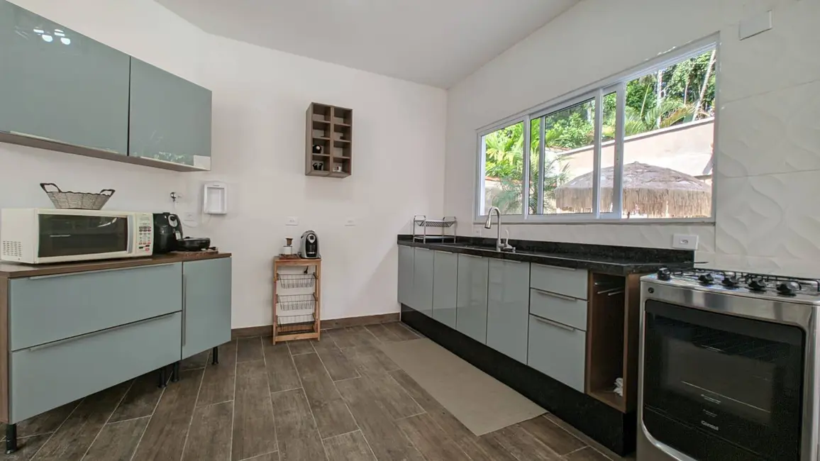 Foto 8 de Casa com 5 quartos à venda, 330m2 em Riviera de São Lourenço, Bertioga - SP