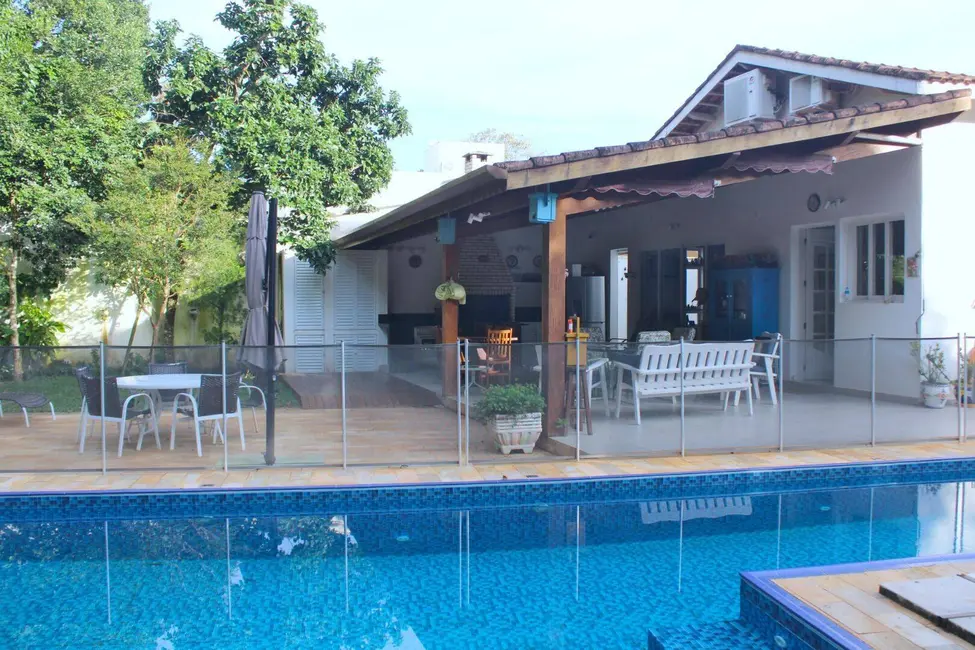 Foto 1 de Casa com 5 quartos à venda, 241m2 em Riviera de São Lourenço, Bertioga - SP