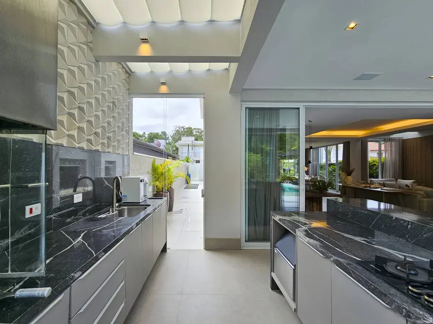 Foto 4 de Casa com 6 quartos à venda, 470m2 em Riviera de São Lourenço, Bertioga - SP