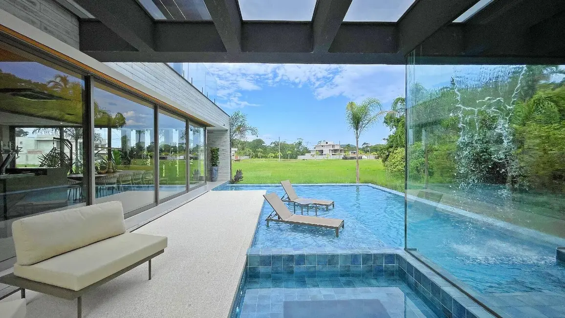 Casa com 7 quartos à venda, 600m2 em Riviera de São Lourenço, Bertioga - SP - imagem 1 Foto 1 de Casa com 7 quartos à venda, 600m2 em Riviera de São Lourenço, Bertioga - SP