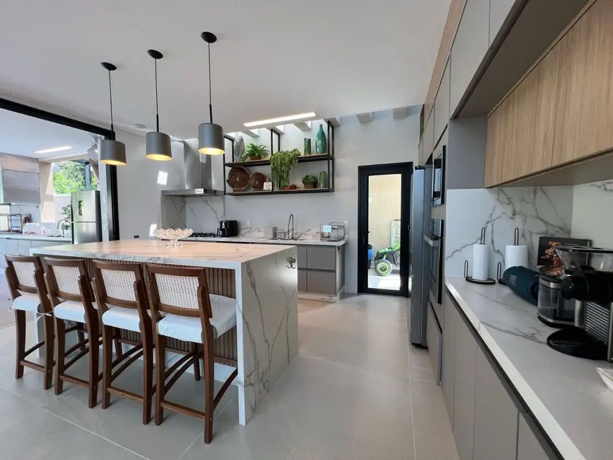 Foto 5 de Casa com 5 quartos à venda, 395m2 em Riviera de São Lourenço, Bertioga - SP