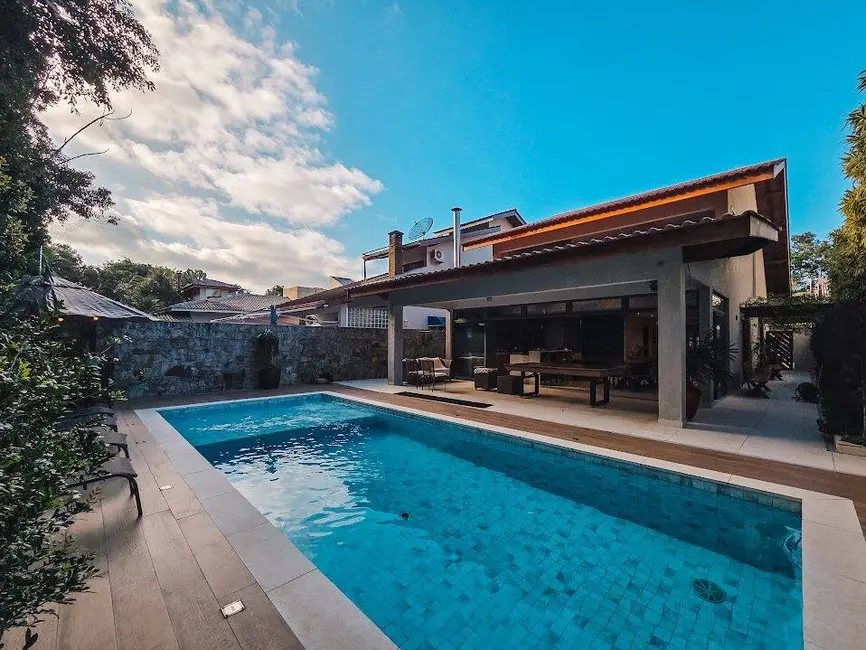 Foto 1 de Casa com 4 quartos à venda, 309m2 em Riviera de São Lourenço, Bertioga - SP