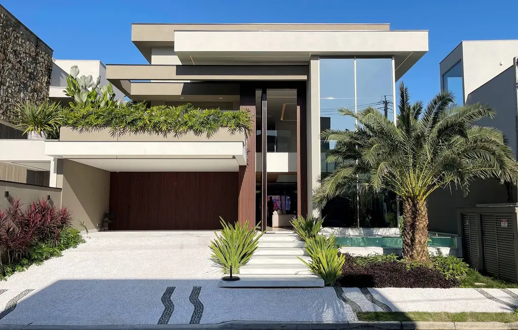 Foto 1 de Casa com 5 quartos à venda, 489m2 em Riviera de São Lourenço, Bertioga - SP