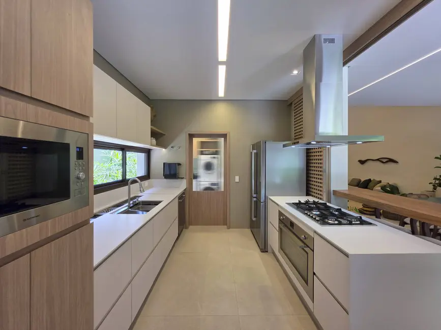 Foto 9 de Casa com 5 quartos à venda, 357m2 em Riviera de São Lourenço, Bertioga - SP