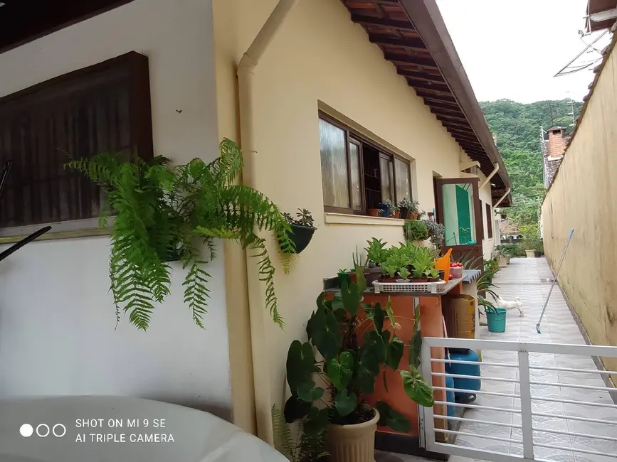 Foto 1 de Casa com 5 quartos à venda, 178m2 em Martim de Sá, Caraguatatuba - SP