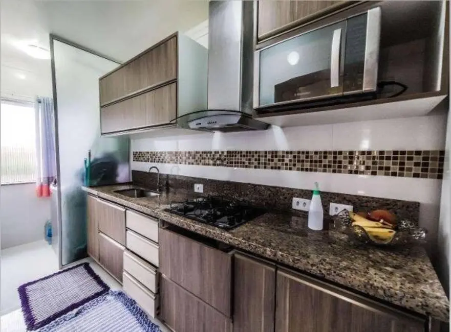 Foto 6 de Apartamento com 2 quartos à venda, 63m2 em Massaguaçu, Caraguatatuba - SP