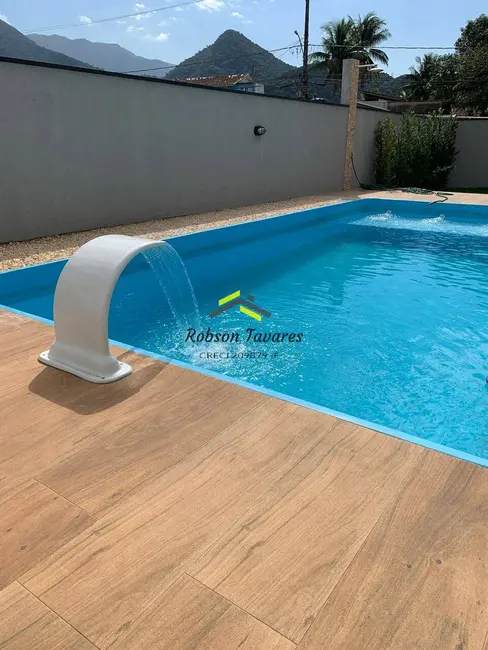 Foto 4 de Casa de Condomínio com 2 quartos à venda, 72m2 em Massaguaçu, Caraguatatuba - SP