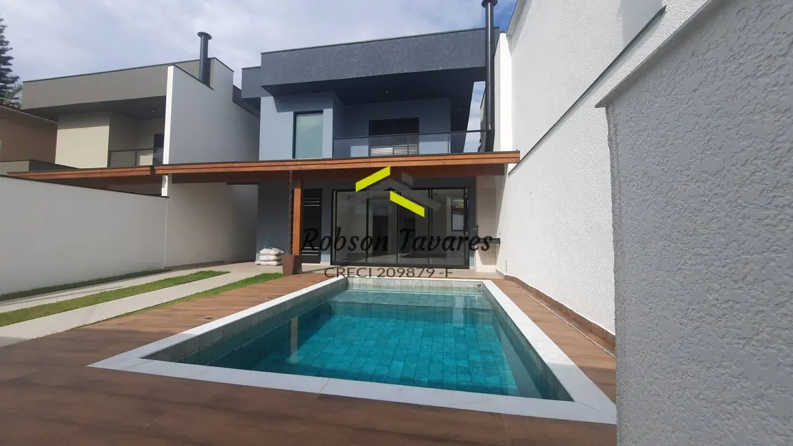 Foto 1 de Casa com 4 quartos à venda, 165m2 em Balneário Copacabana, Caraguatatuba - SP