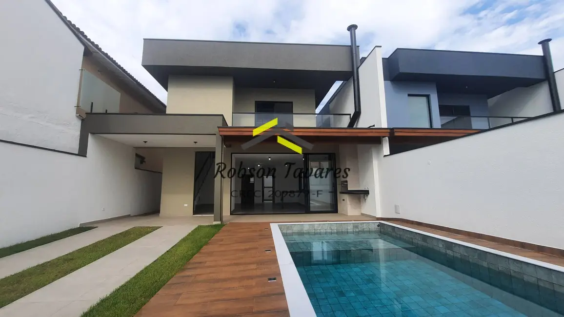 Foto 1 de Casa com 4 quartos à venda, 165m2 em Balneário Copacabana, Caraguatatuba - SP