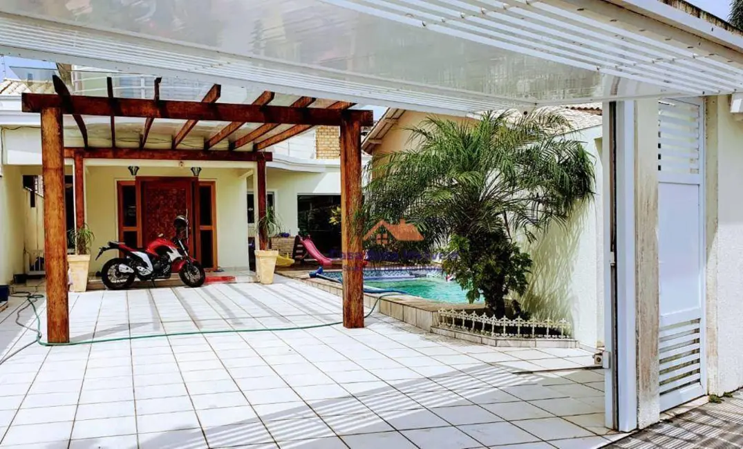 Foto 1 de Sobrado com 4 quartos à venda, 170m2 em Solemar, Praia Grande - SP