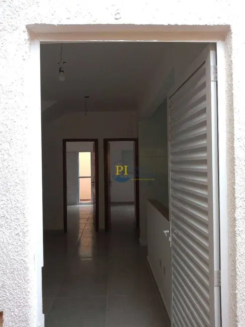 Foto 2 de Casa de Condomínio com 2 quartos à venda, 48m2 em Caiçara, Praia Grande - SP
