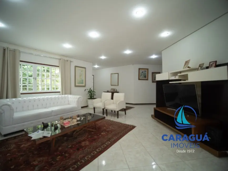 Foto 3 de Casa de Condomínio com 3 quartos à venda, 241m2 em Martim de Sá, Caraguatatuba - SP