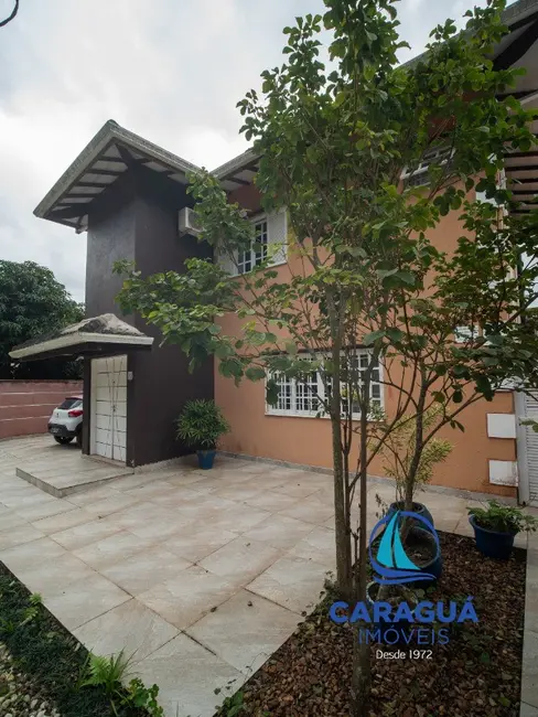 Foto 1 de Casa de Condomínio com 3 quartos à venda e para alugar, 241m2 em Martim de Sá, Caraguatatuba - SP