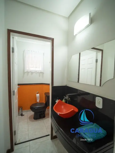 Foto 9 de Casa de Condomínio com 3 quartos à venda, 241m2 em Martim de Sá, Caraguatatuba - SP