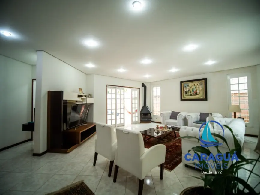 Foto 4 de Casa de Condomínio com 3 quartos à venda, 241m2 em Martim de Sá, Caraguatatuba - SP