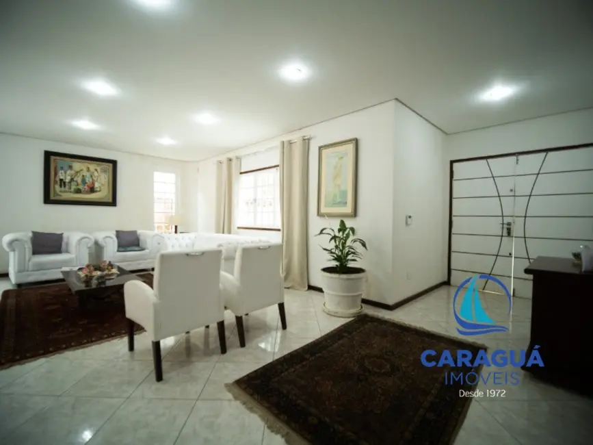Foto 2 de Casa de Condomínio com 3 quartos à venda e para alugar, 241m2 em Martim de Sá, Caraguatatuba - SP