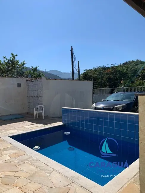 Foto 2 de Casa com 2 quartos para alugar, 60m2 em Martim de Sá, Caraguatatuba - SP
