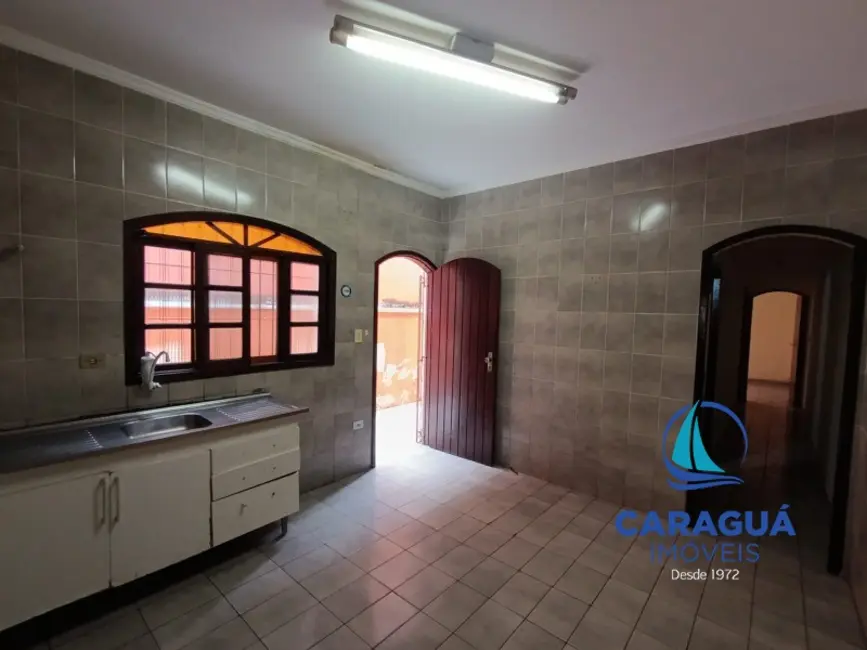 Foto 8 de Casa com 3 quartos à venda, 104m2 em Jardim Jaqueira, Caraguatatuba - SP