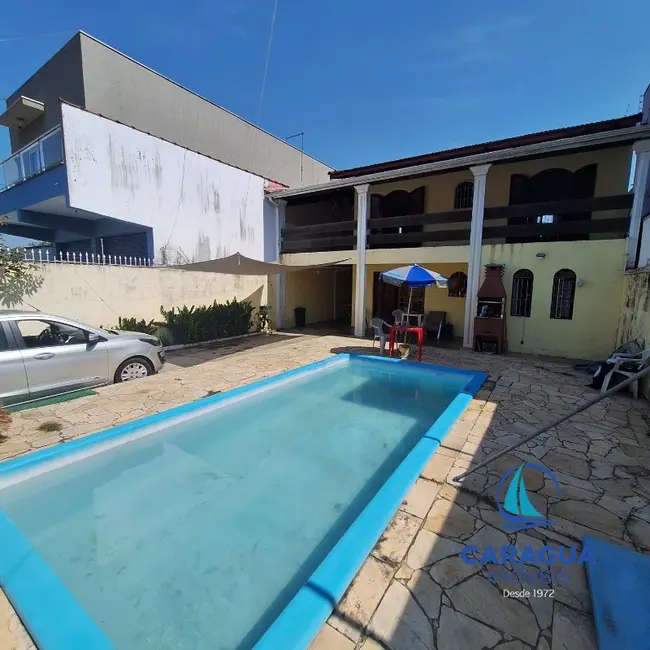 Foto 1 de Casa com 3 quartos à venda, 218m2 em Sumaré, Caraguatatuba - SP