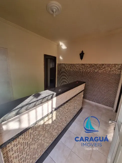 Foto 1 de Casa com 2 quartos para alugar, 70m2 em Martim de Sá, Caraguatatuba - SP