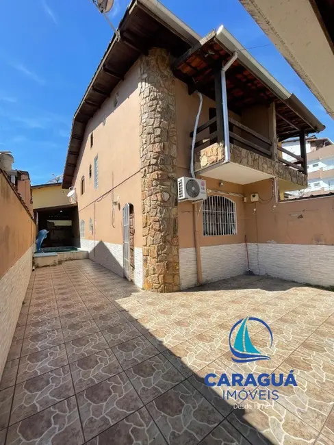 Foto 2 de Casa com 3 quartos à venda, 103m2 em Martim de Sá, Caraguatatuba - SP